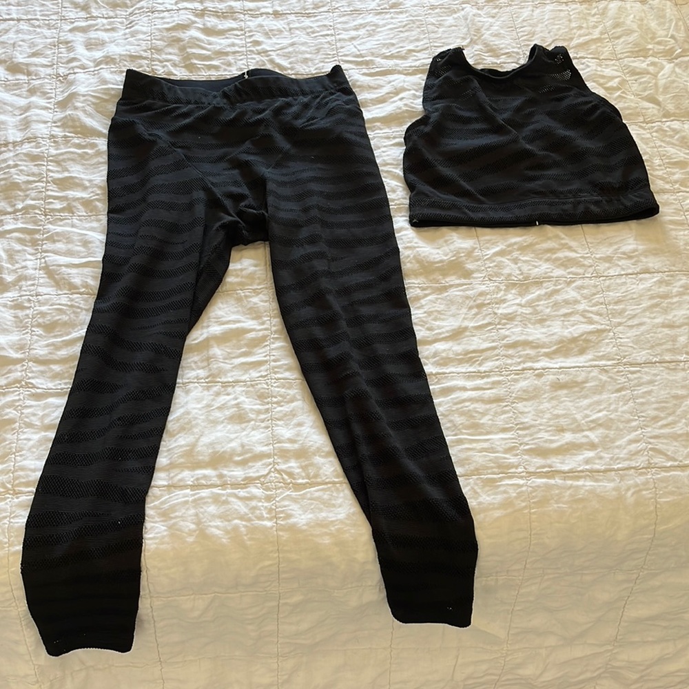 Black leggings and racerback sports bra